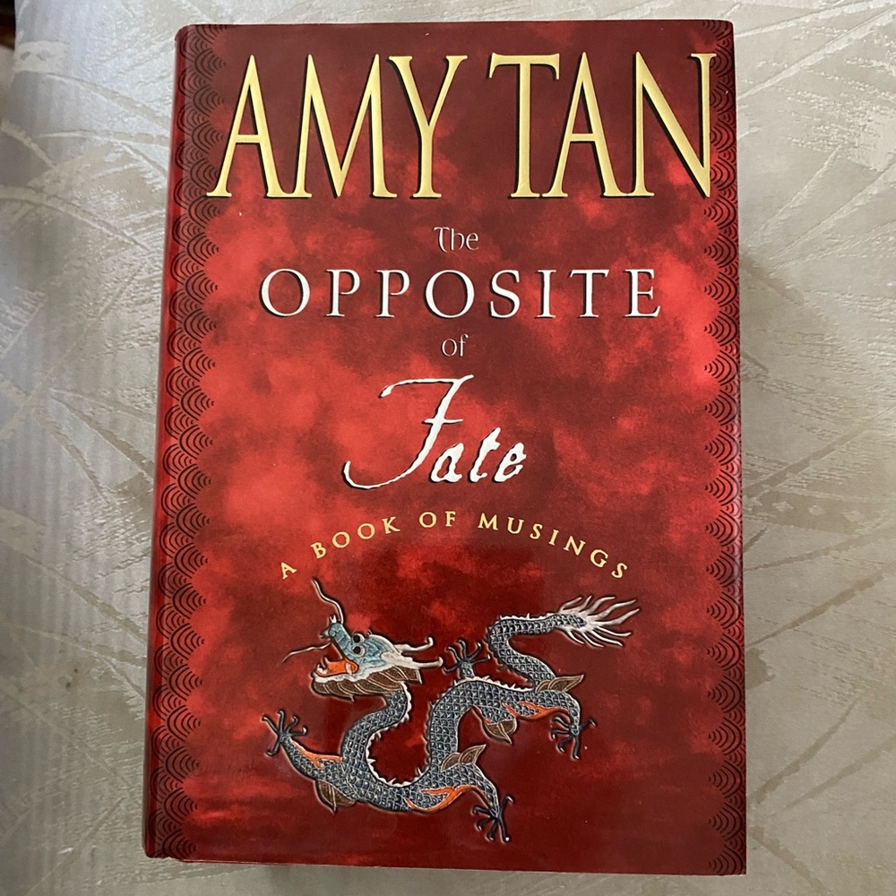's The Opposite of Fate: Red Hardcover with Silver Dragon